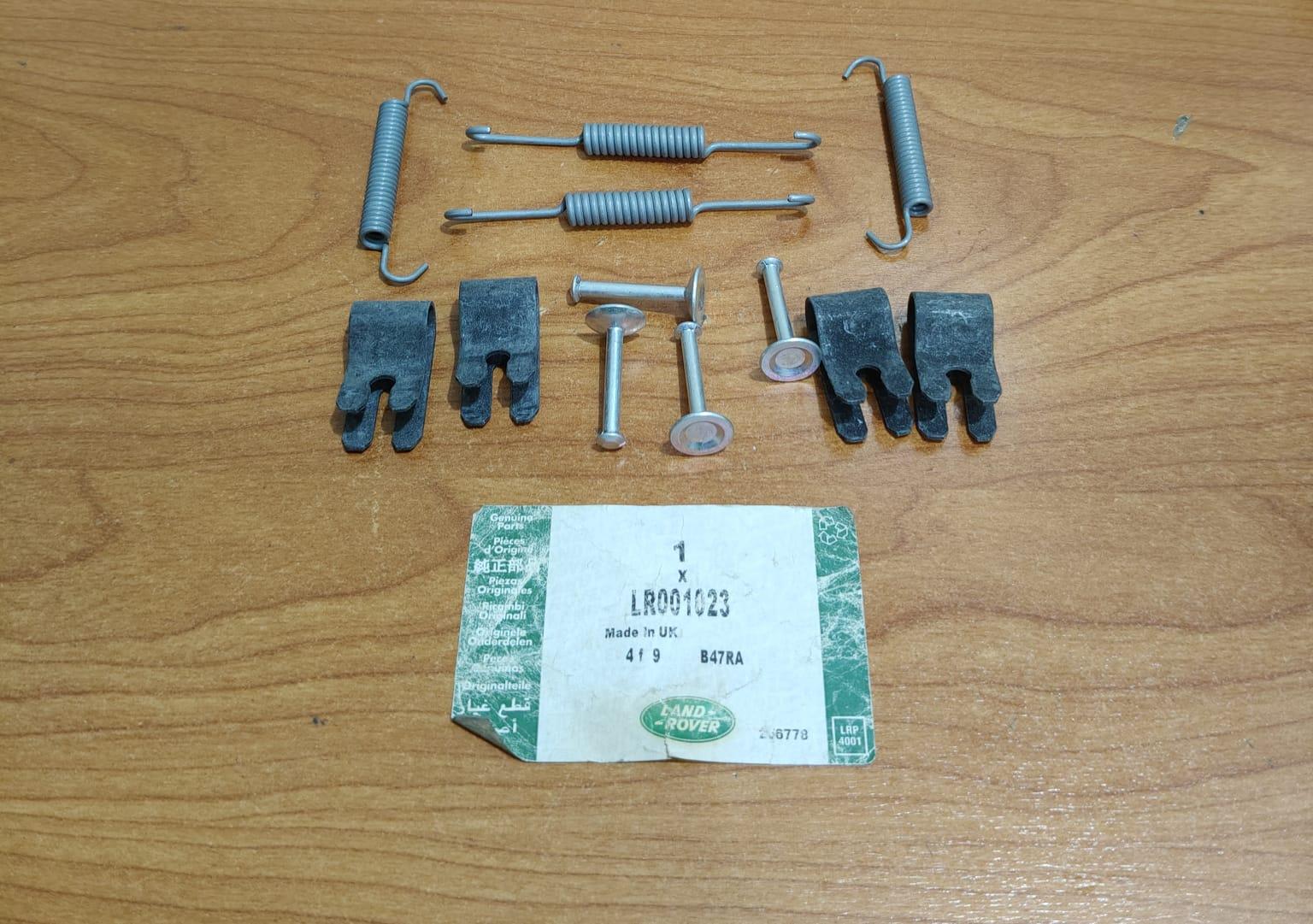 Land Rover LR001023 Park Brake Shoe Spring Genuine LR2 2008-2012